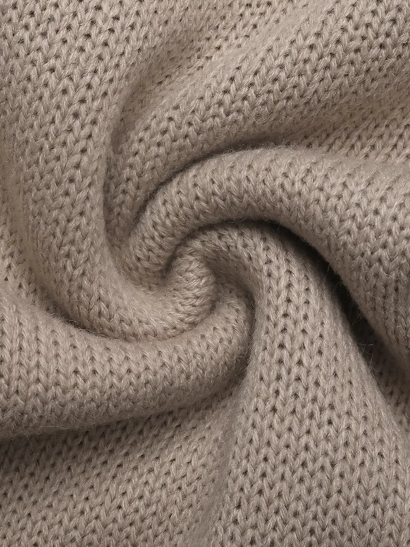 Gray apricot knit cardigan with a textured stitch detail and soft fabric.