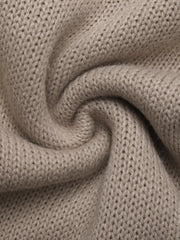 Gray apricot knit cardigan with a textured stitch detail and soft fabric.