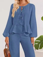 Dusty Blue textured peplum co-ord set with tie-neck detail and balloon sleeves.