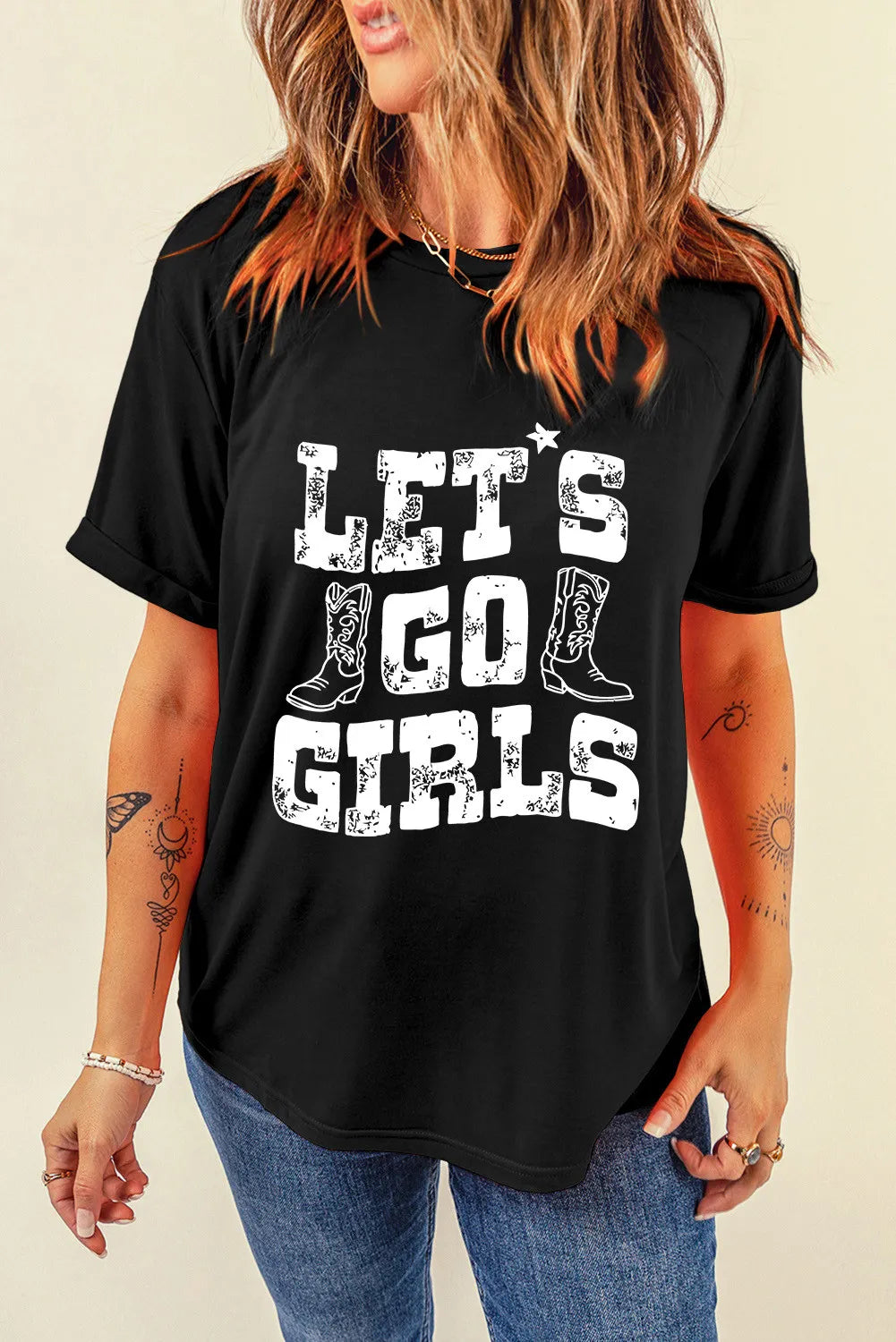 Black graphic tee with distressed "Let's Go Girls" text and cowboy boot graphic