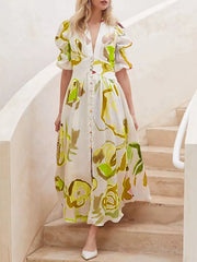 White abstract print midi dress with puff sleeves and button front