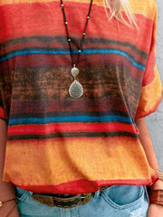 Casual t-shirt with brushstroke stripes in orange, red, brown, and blue.