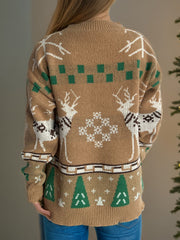 Tan acrylic knit sweater with reindeer, snowflake, and Christmas tree motifs.