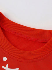 Red crew neck sweatshirt with white cat graphic detail