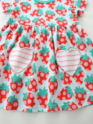 Toddler cotton dress with strawberry print and heart pockets.
