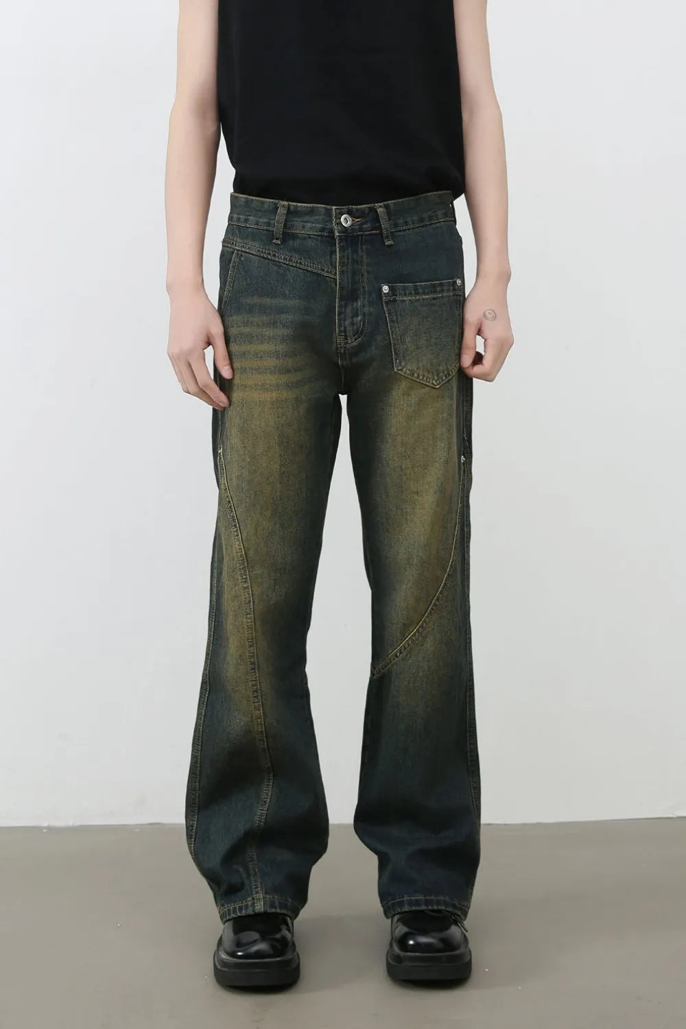 Dark faded seam detail bootcut jeans with a distressed wash.