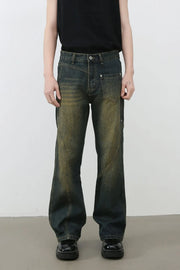 Dark faded seam detail bootcut jeans with a distressed wash.