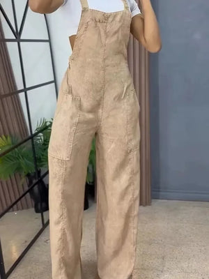 Khaki denim wide-leg overalls with bib front and large pockets.