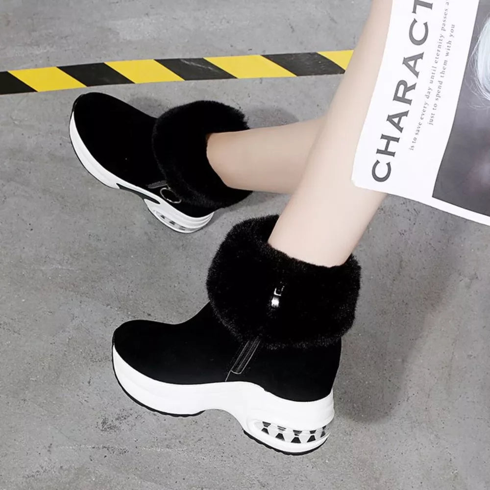 Black plush side-zipper ankle boots with air cushion sole and fur trim.