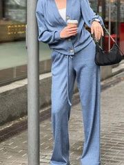 Dusty blue button-front lounge set with drawstring pants and a V-neck cardigan.