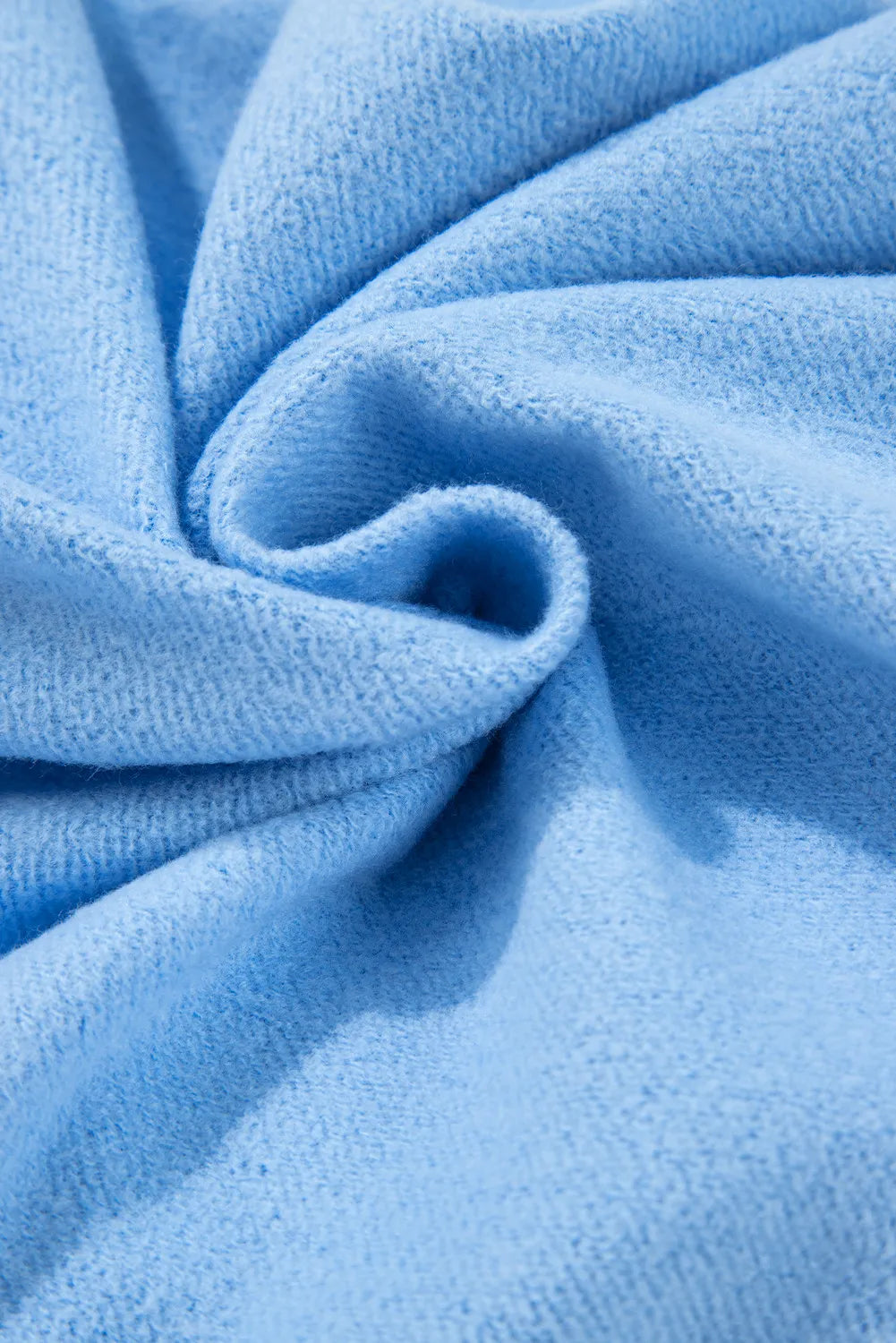 Pastel blue loungewear fabric detail, soft knit texture