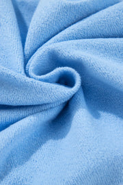 Pastel blue loungewear fabric detail, soft knit texture