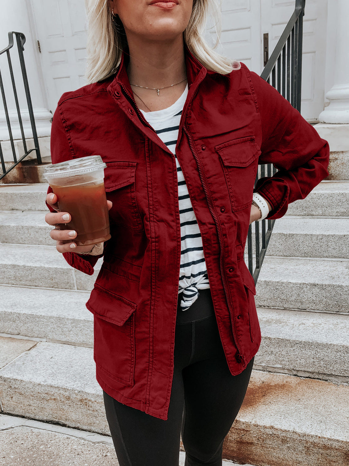 Utility jacket in Rust with multiple pockets and a zip-snap front closure.