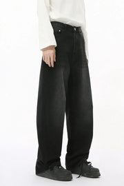 Oversized baggy wash denim trousers in dark wash, with a relaxed fit and wide leg.