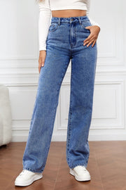 Light blue denim jeans with a wide leg and sculpted waist, buttoned closure.
