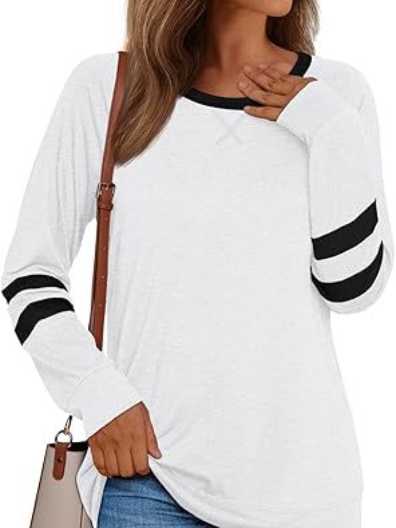 White long sleeve t-shirt with black stripes on sleeves and black neckline