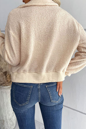 Cream teddy fleece bomber jacket with collared neck and ribbed hem.