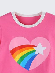 Toddler t-shirt in pink cotton with a white ringer neck, featuring a heart graphic with a rainbow and star.