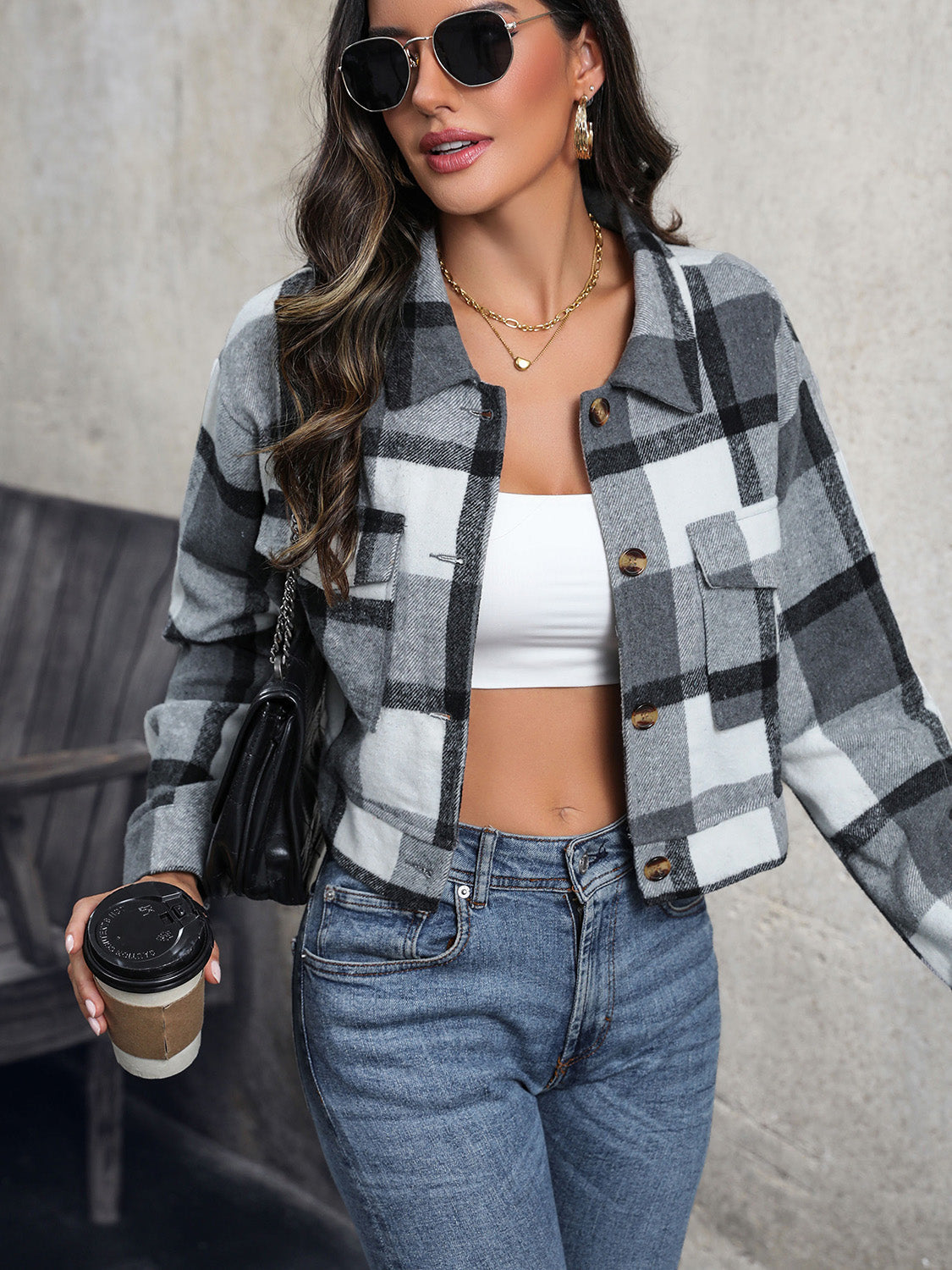 Checked plaid shacket in dark gray with button front and patch pockets.