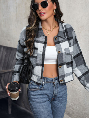 Checked plaid shacket in dark gray with button front and patch pockets.