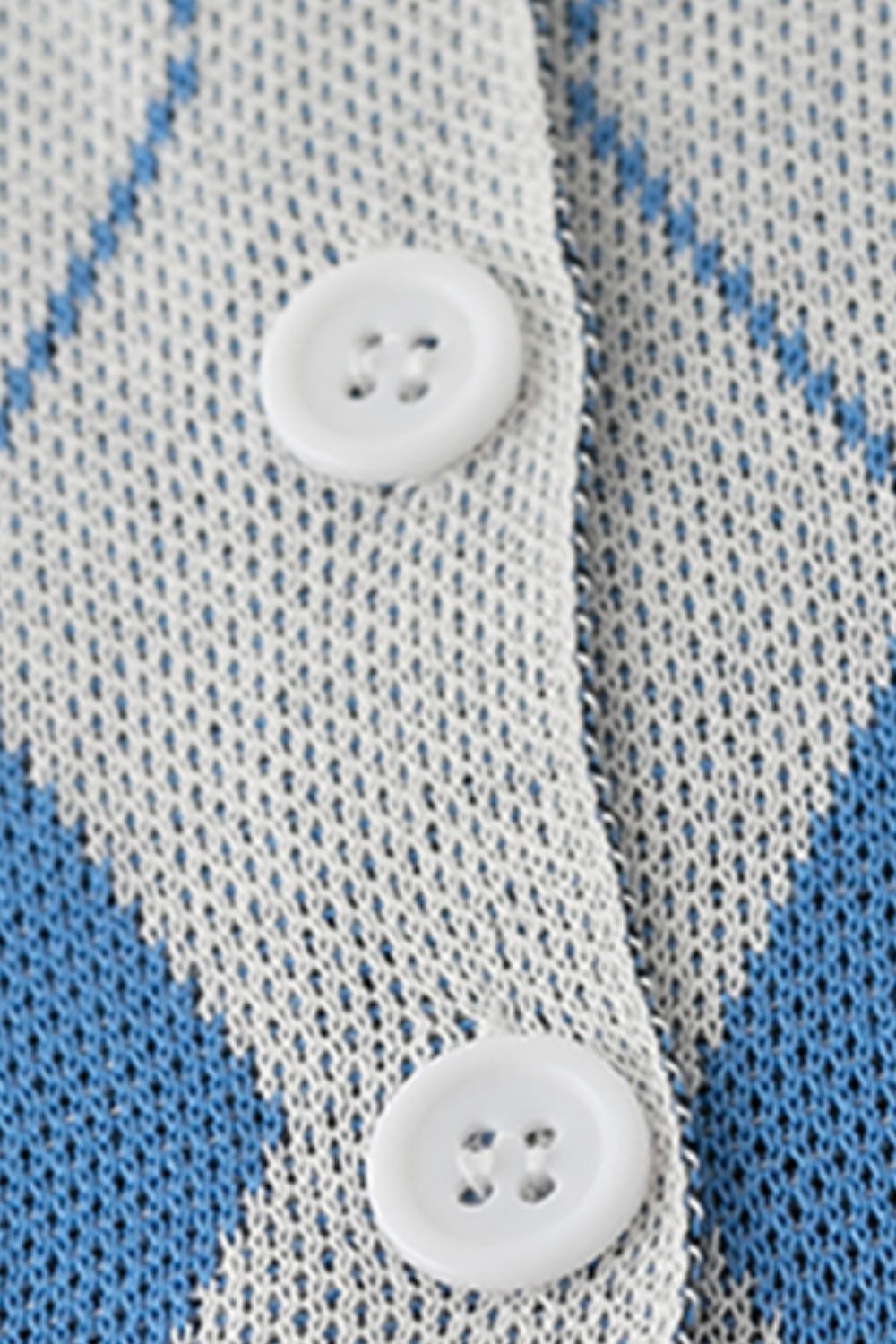 Argyle knit cropped cardigan with white buttons and blue accents