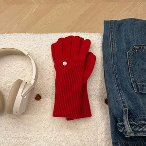 Red convertible ribbed knit touchscreen gloves with a button detail.
