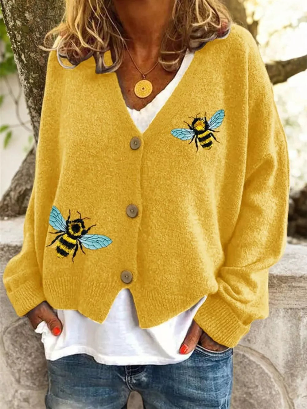 Yellow V-neck button-down acrylic cardigan with bee embellishments