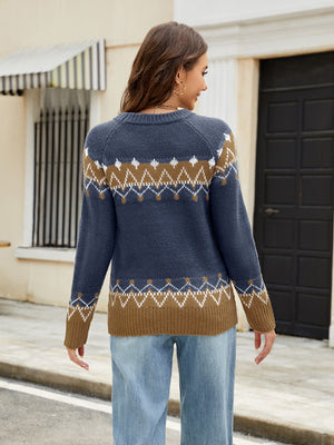 Fair Isle yoke knit sweater in dark gray with brown and white geometric pattern.