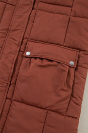Brown quilted longline puffer coat with snap patch pockets