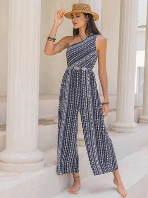 Printed asymmetric palazzo jumpsuit in black and white with a one-shoulder neckline and wide legs.