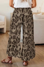 Camo print maternity pants with ruffled hem and wide legs.