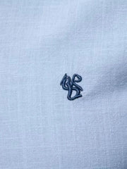 Light blue linen shirt with embroidered detail