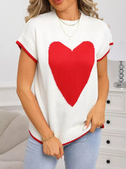 White knit top with large red heart, crew neck, ribbed accents and red trim