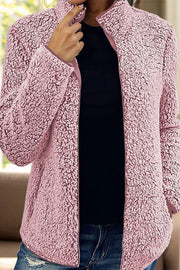 Dusty Pink teddy fleece zip-up jacket with stand collar and pockets.