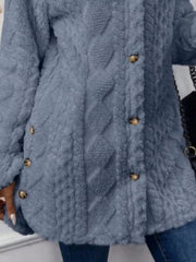 Blue textured button-down coat with cable knit pattern and button detail