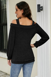 Black sweater with cold shoulder neckline and long sleeves, casual style.
