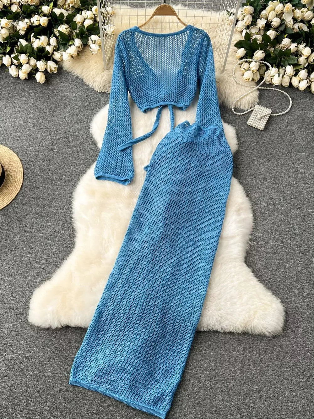 Blue knit tied crop top and high slit maxi skirt set