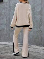 Tan ribbed knit lounge set with black trim and slit hem pants