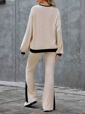 Tan ribbed knit lounge set with black trim and slit hem pants