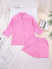 Pink gauze cotton resort shirt and shorts set with button front and elastic waist shorts.