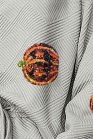 Textured lounge top with a sequined pumpkin patch detail.