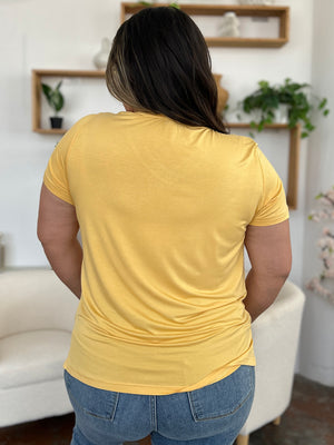 Yellow bamboo t-shirt with short sleeves and asymmetric hemline, V-neck top