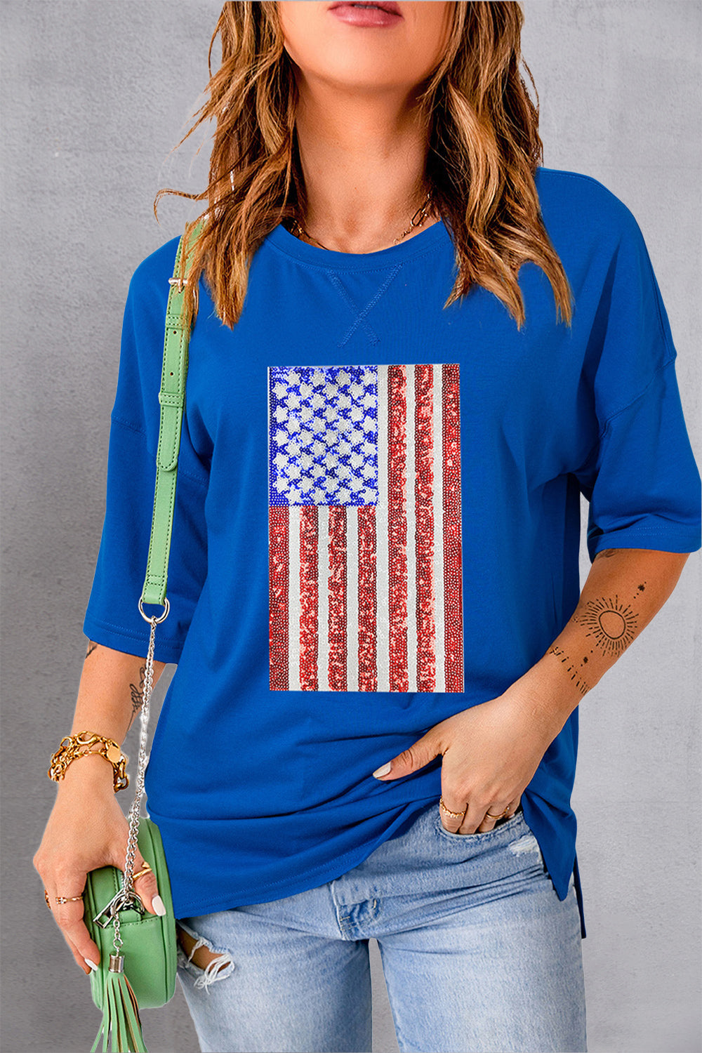 Royal blue boxy tee with embellished American flag graphic, crew neck, and 3/4 sleeves.