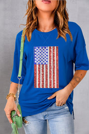 Royal blue boxy tee with embellished American flag graphic, crew neck, and 3/4 sleeves.