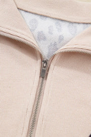 Leopard print zip-up collar mini dress in beige cotton with a silver zipper.