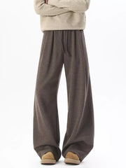 Brown wide-leg sweatpants with adjustable drawstring waist and comfortable fit.