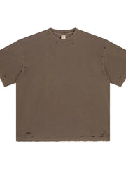 Distressed oversized cotton tee in coffee brown with raw hem and ripped details.