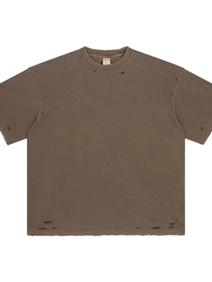 Distressed oversized cotton tee in coffee brown with raw hem and ripped details.