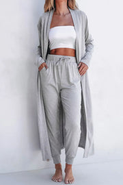 Gray duster and jogger set with drawstring waist and pockets, styled with a white tube top.