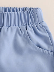 Sky blue toddler shorts with elastic waistband and side pockets.